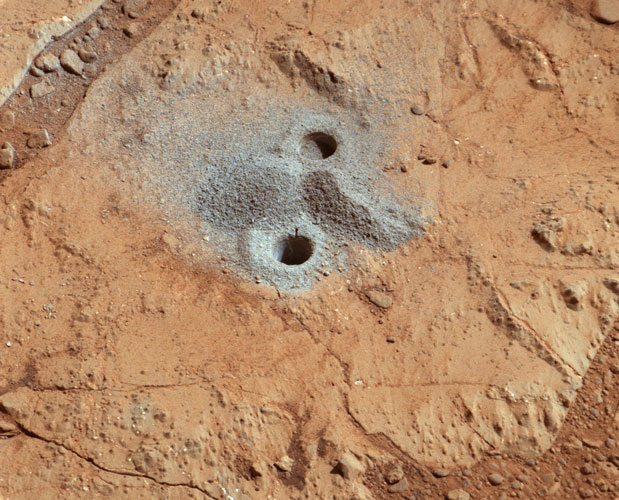 MSL drilling into rock called "John Klein" (note the gray powder)